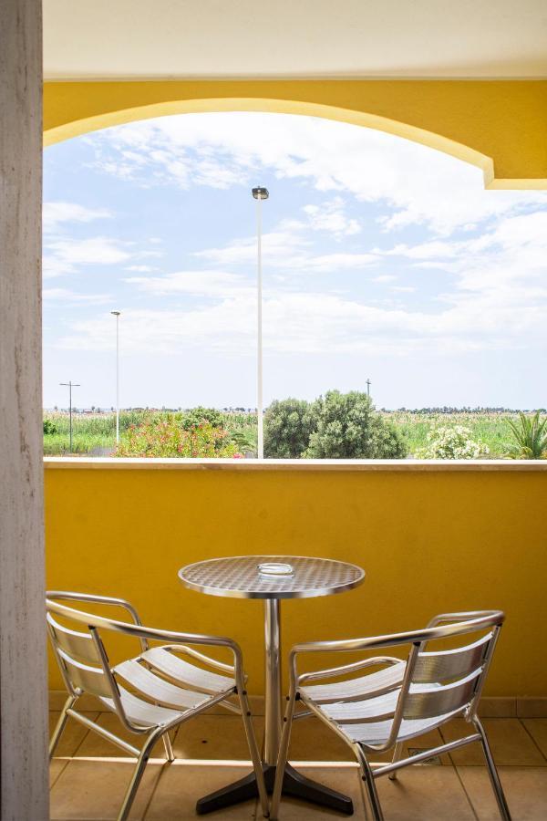 Il Fenicottero Hotel Quartu Sant'Elena Bagian luar foto